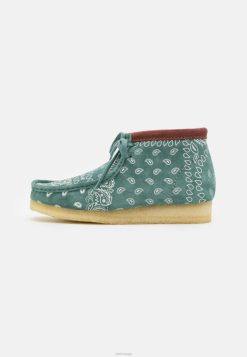 Clarks unisex grønne clarks wallabee uformelle snørebånd 8N86P7147 grønn